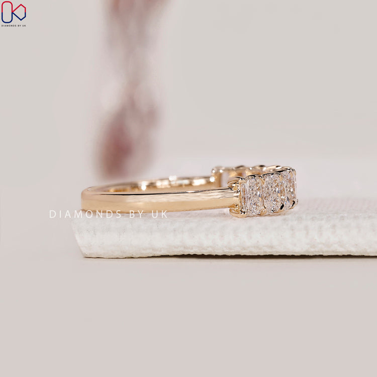 Lab Grown Diamond band in radiant cut with a classic prong setting.
