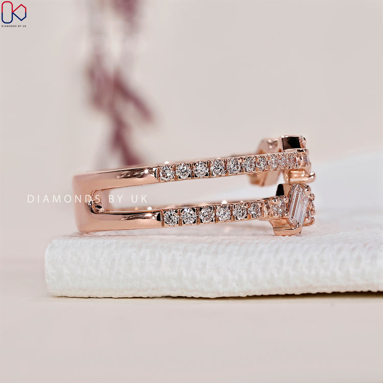 Unique wedding band with intricate details and contemporary style.
