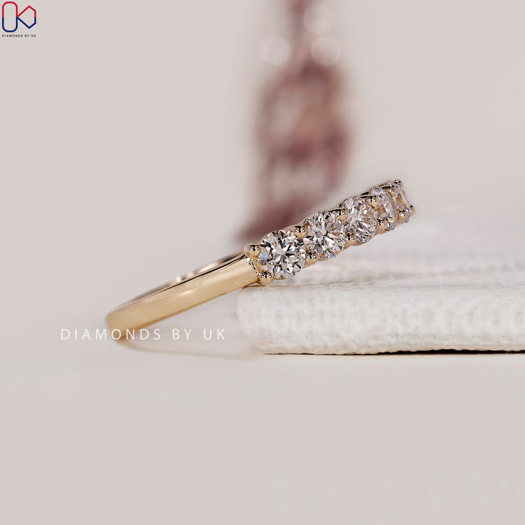 Handmade band in yellow gold diamond band.
