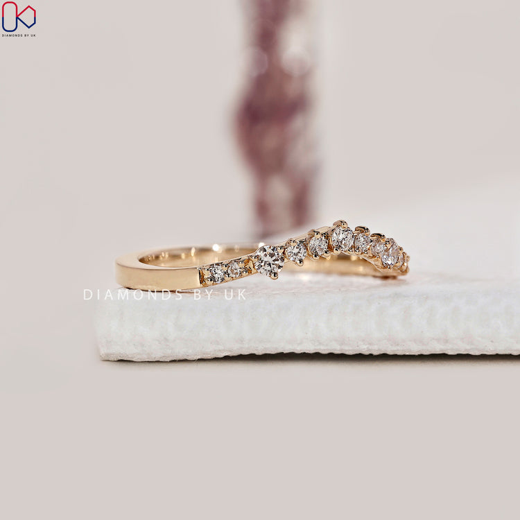 prong setting on dainty wedding band design
