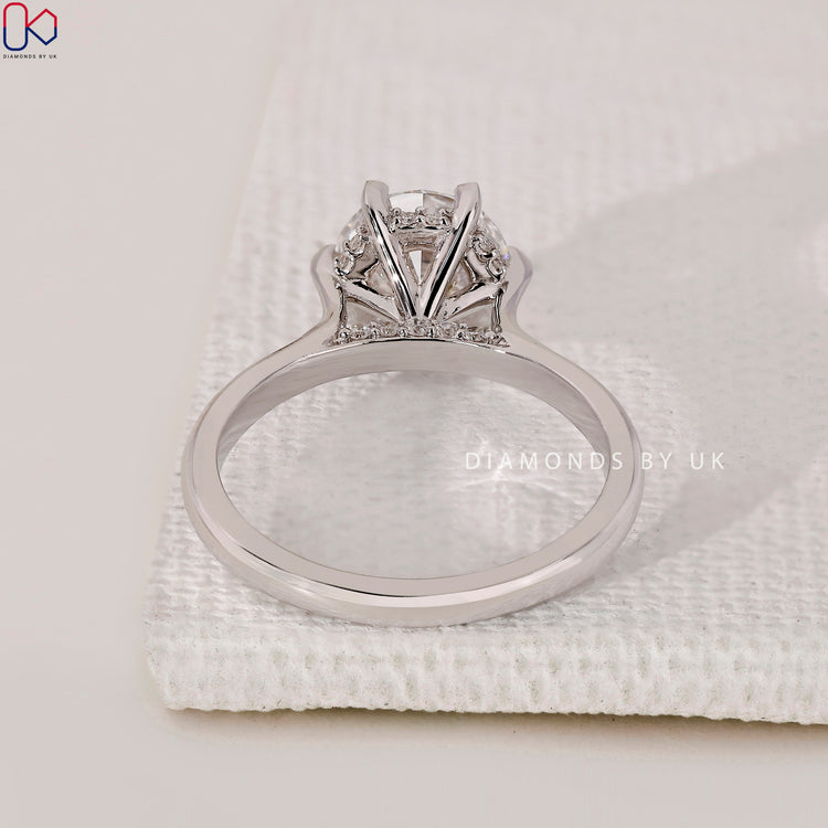 Hidden halo ring enhancing the diamond’s brilliance.
