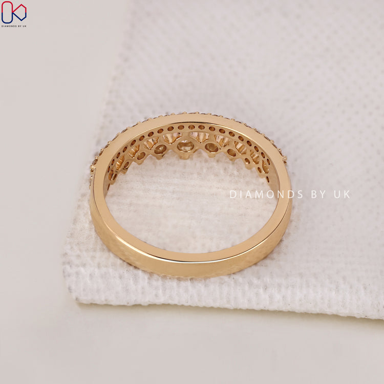 A Diamondsbyuk wedding band with a double row design in white gold brilliance.