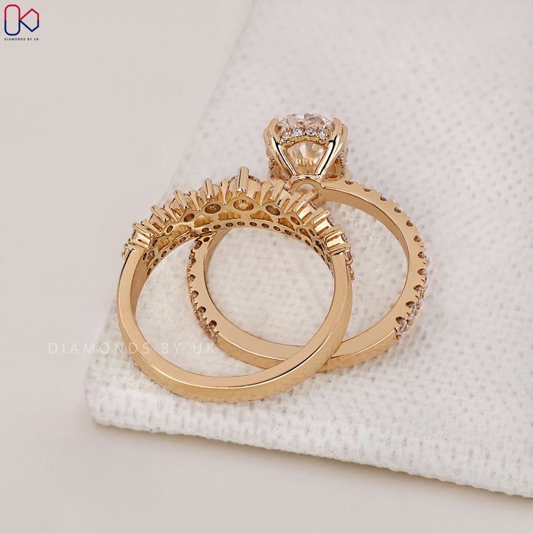 Yellow gold bridal set with coordinated engagement and wedding rings.
