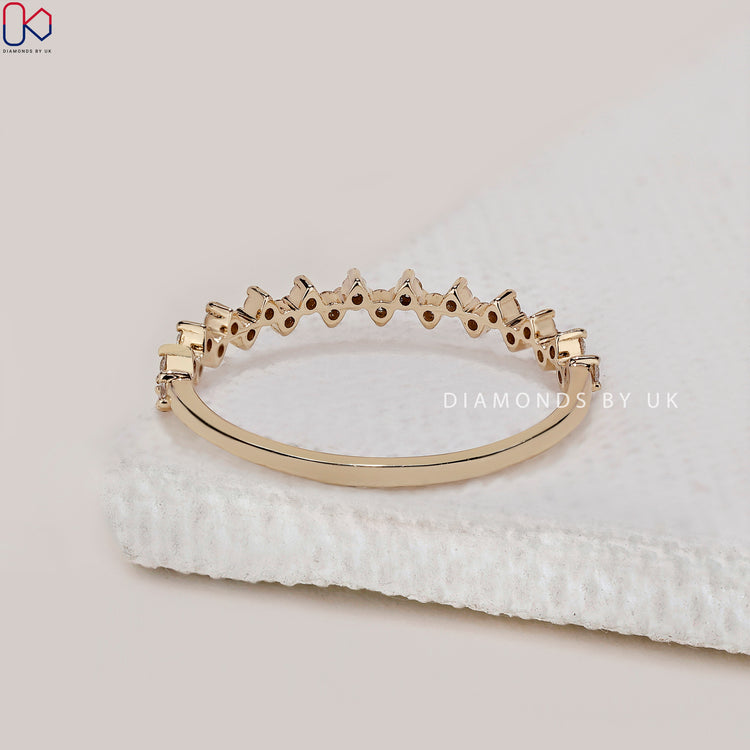 Diamondsbyuk wedding band crafted with a round diamond zig zag stacking style.