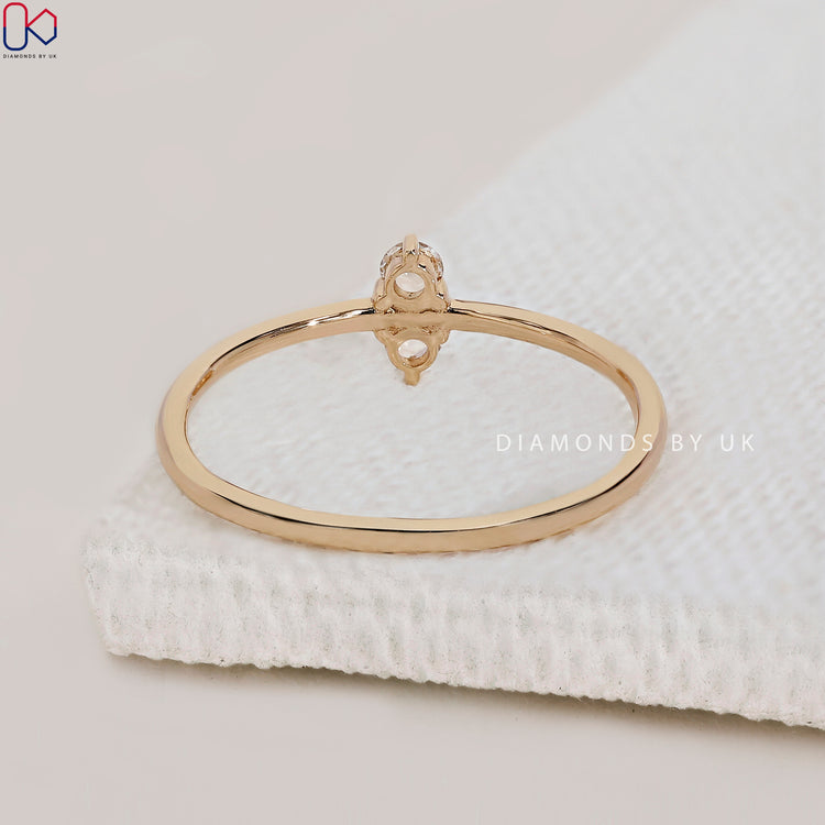 IGI certified two stone engagement ring with round diamonds.
