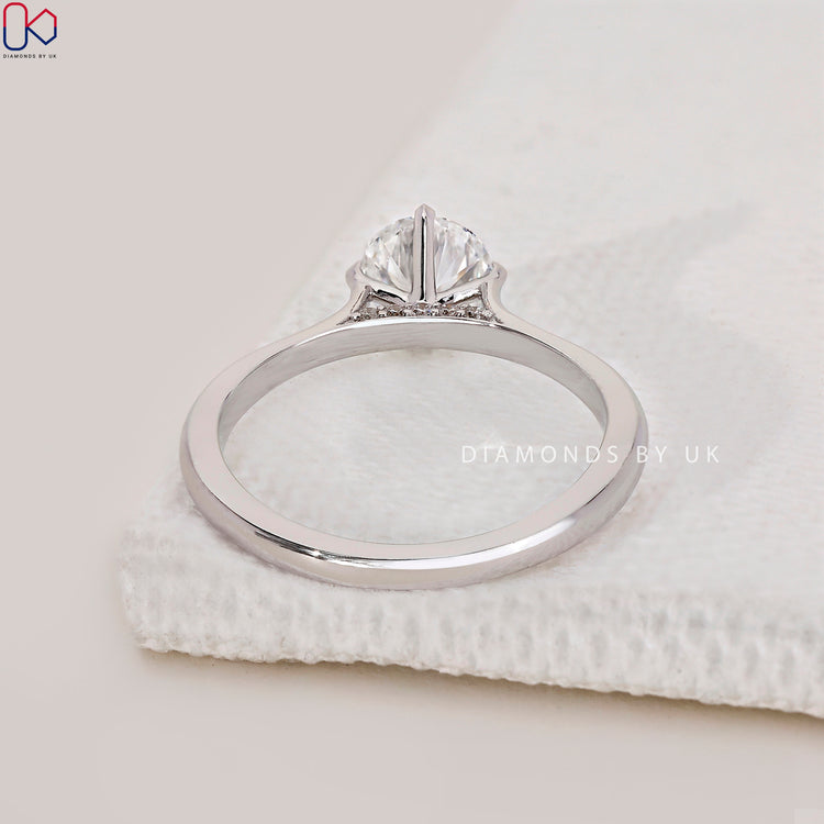Lab grown diamond ring with compass prong setting.
