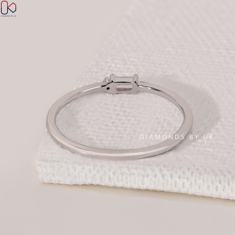 Handmade band crafted with round and baguette diamond band details.
