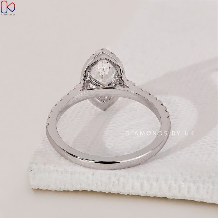 White gold diamond ring featuring a beautiful marquise diamond.
