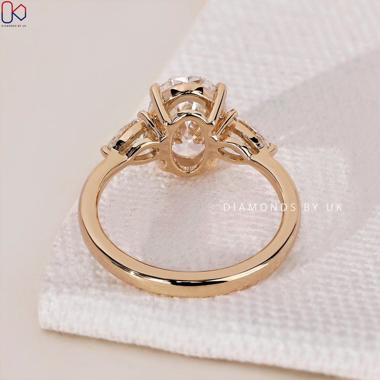 Yellow gold engagement ring with sparkling diamonds.
