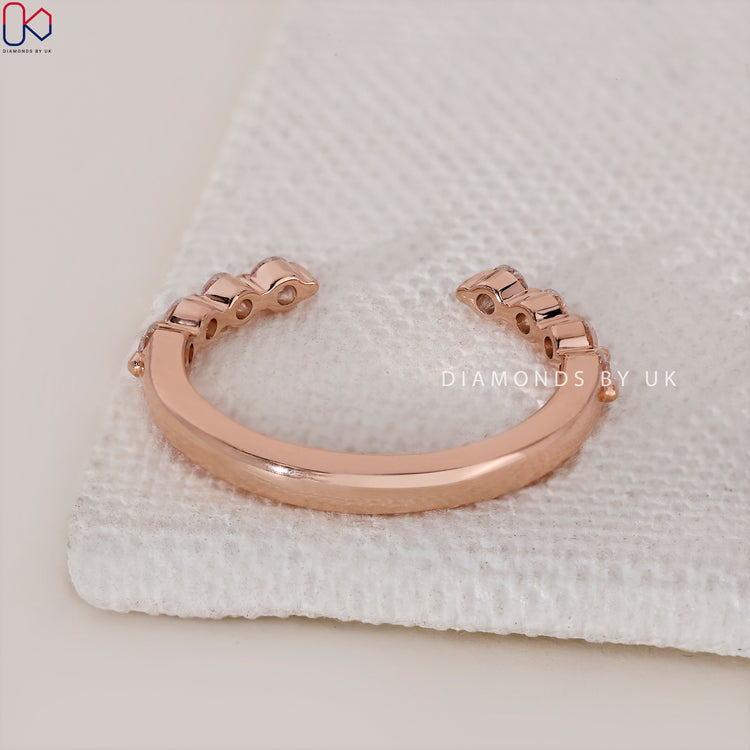 Lab Grown Diamond band with round cut stones.
