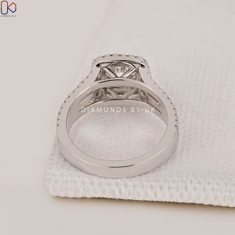 Prong set double halo engagement ring from Diamondsbyuk in handcrafted white gold.