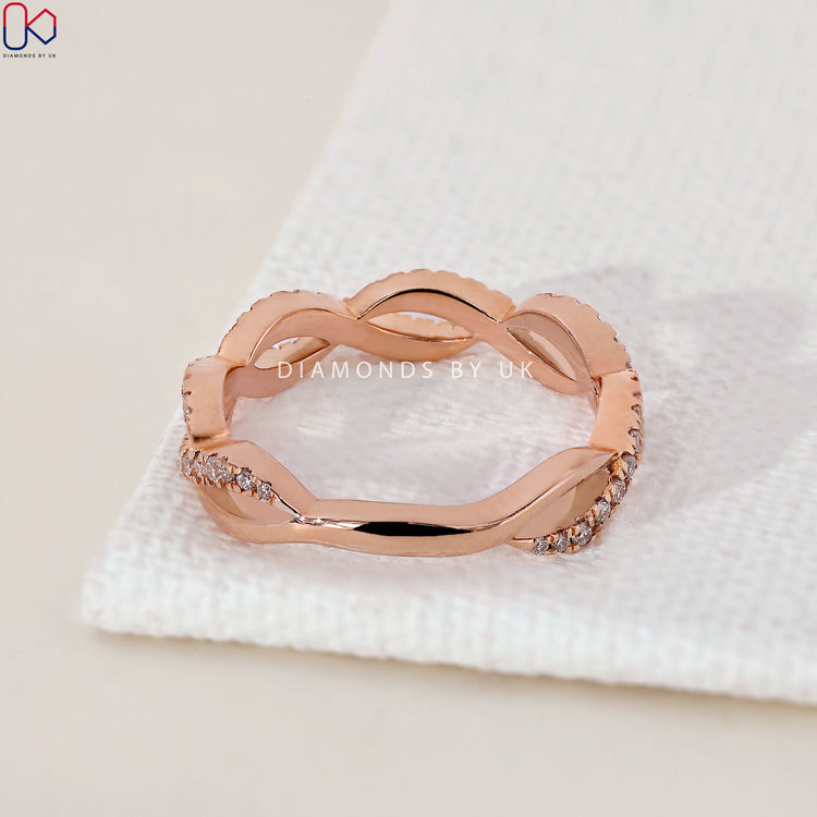 Handmade jewellery with twisted diamond wedding band and custom style.