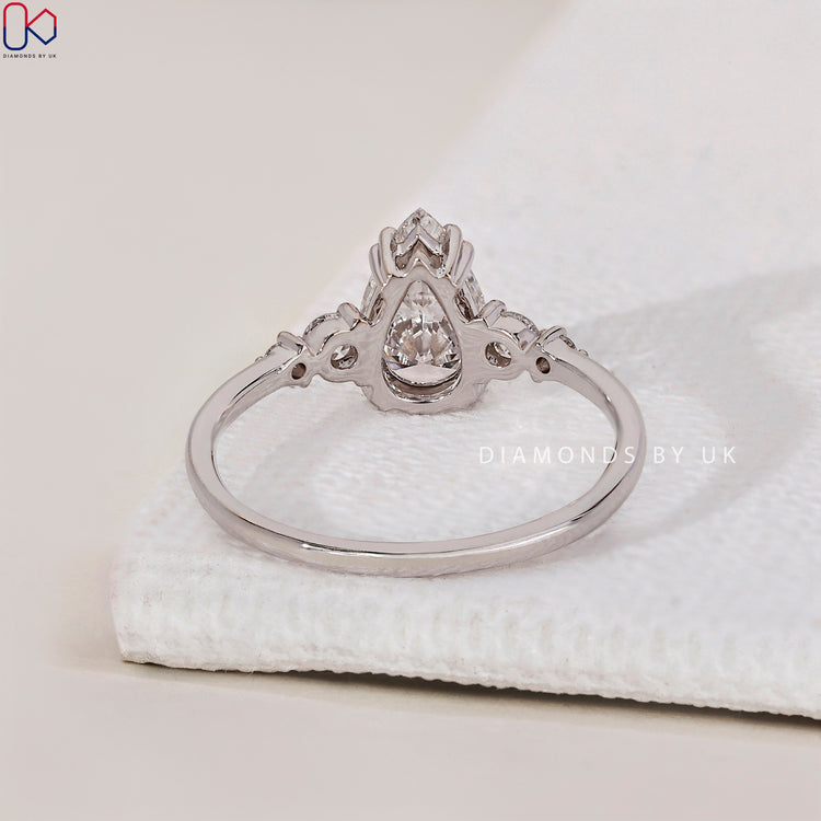 Engagement Ring UK with a stunning pear shaped diamond for a unique style.
