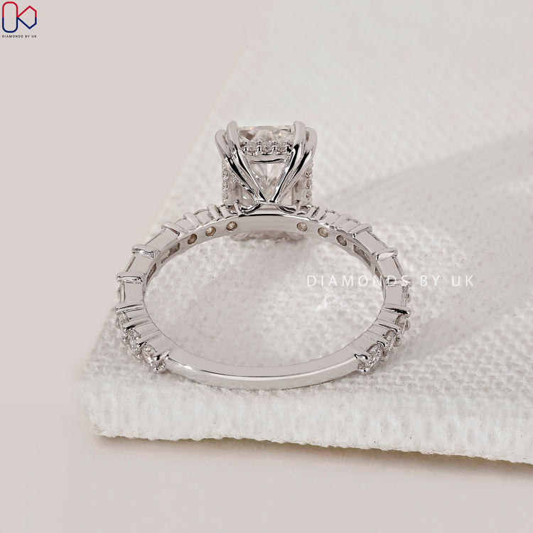 IGI certified radiant cut engagement ring with baguette accents.

