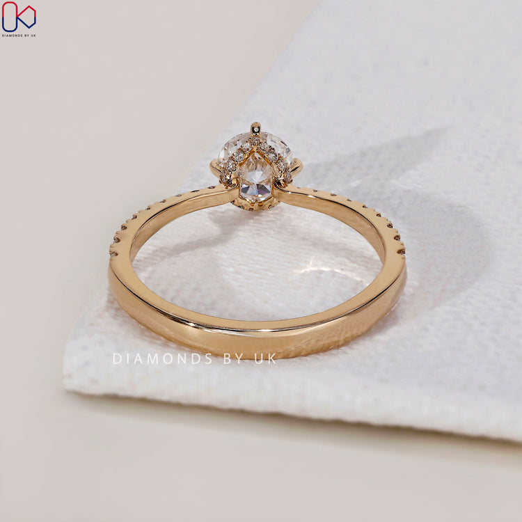 IGI certified hidden halo engagement ring with a high-quality round diamond ring.

