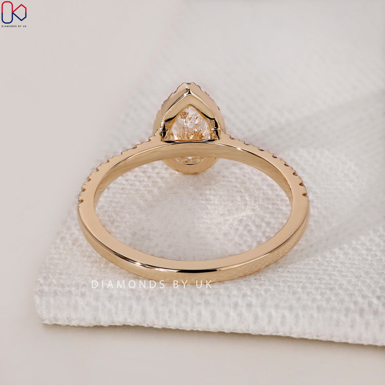 Shop to buy engagement ring featuring a stunning pear shaped engagement ring design.
