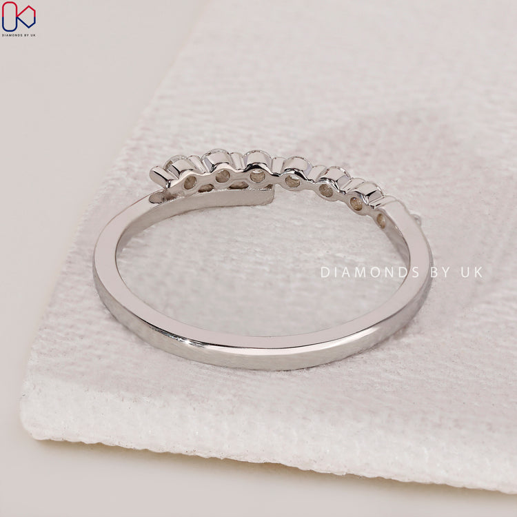 White gold wedding band crafted with a polished and luxurious finish.