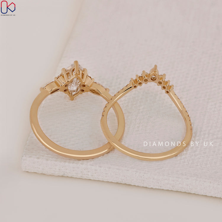 Pear and round wedding band for a unique bridal style.
