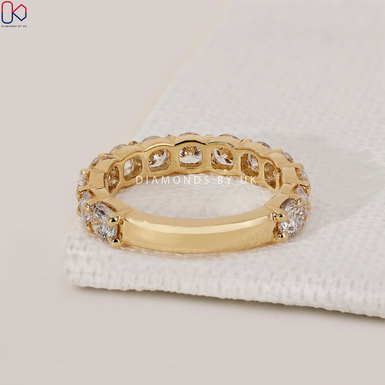Handmade jewellery crafted into a round cut diamond band.
