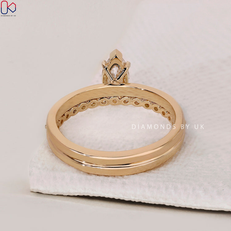 Handmade jewellery with a marquise ring and eternity band.
