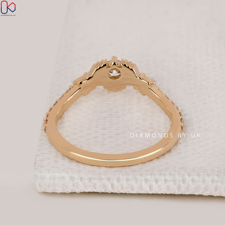 Diamondsbyuk engagement ring with Celtic Claddagh design, perfect for proposals or anniversaries.