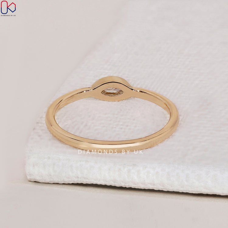 Handmade jewellery featuring a bezel setting ring
