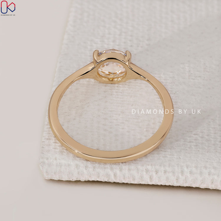 Diamondsbyuk engagement ring crafted in yellow gold with antique rose cut styling.