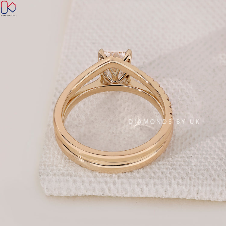 Yellow gold bridal set with coordinated engagement and wedding rings.
