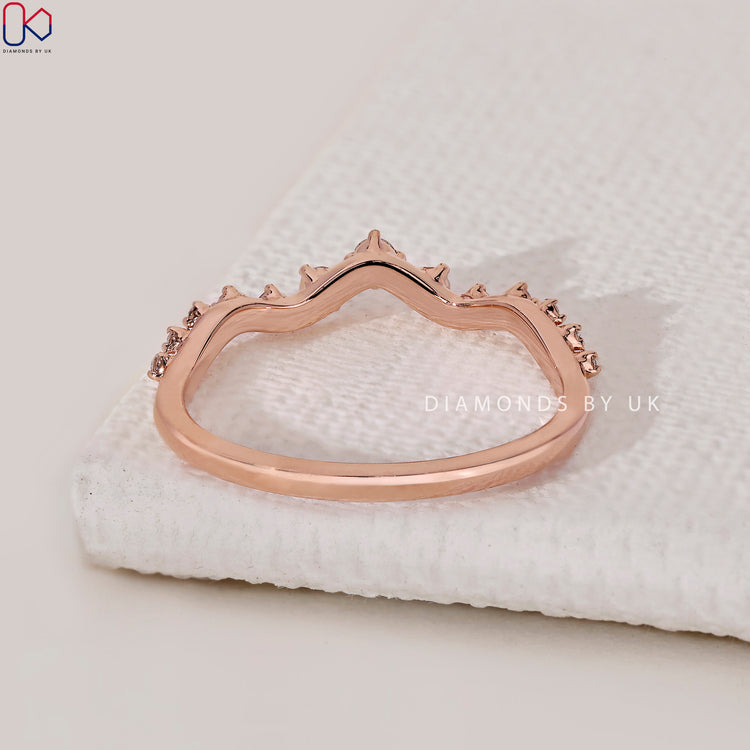 Handmade band with round cut diamonds for a timeless look.
