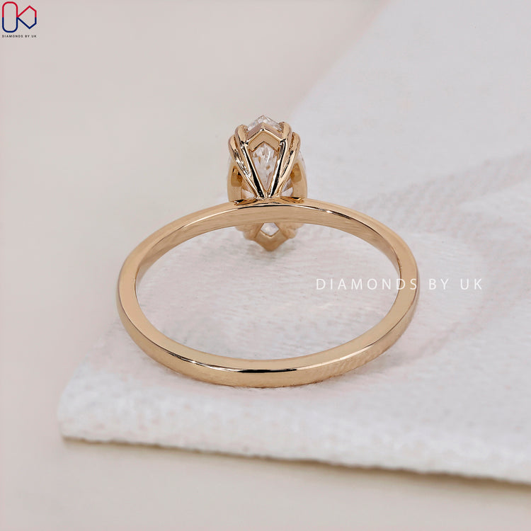 Double prong ring setting for a secure and brilliant diamond.