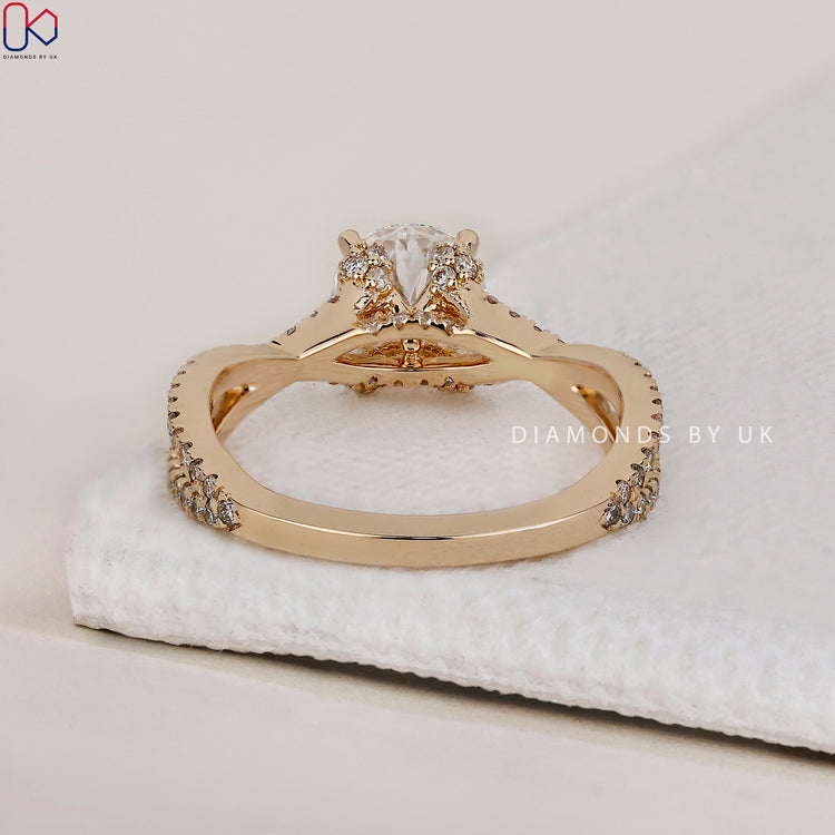 Lab Grown Diamond set in a beautiful twisted band ring for an eco-friendly choice.