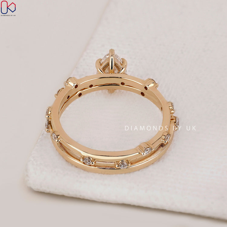 Round cut wedding band complements your engagement ring.
