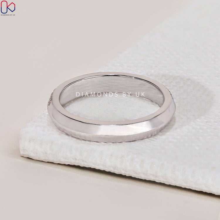 Lab grown diamond band offering eco-friendly beauty and style.
