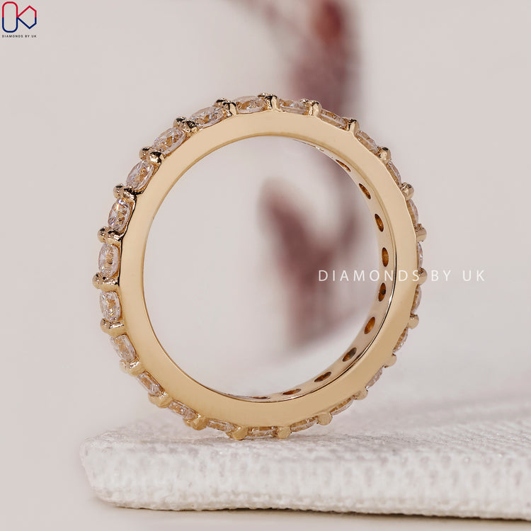Yellow gold diamond band for a classic touch.
