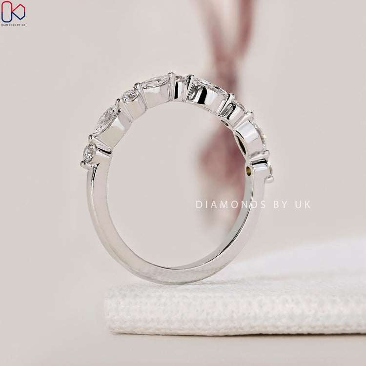 V shaped wedding band with lab grown diamonds for a sustainable choice.
