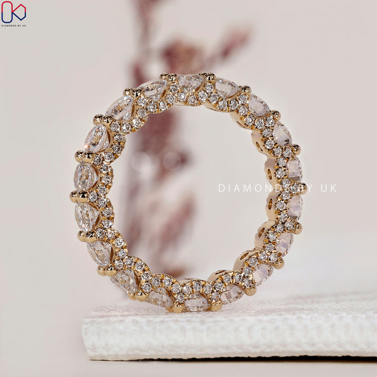 Micro pave set eternity band with dazzling diamonds for added brilliance.
