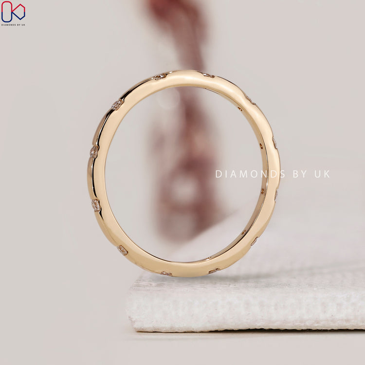 Lab Grown Diamond band in yellow gold finish.
