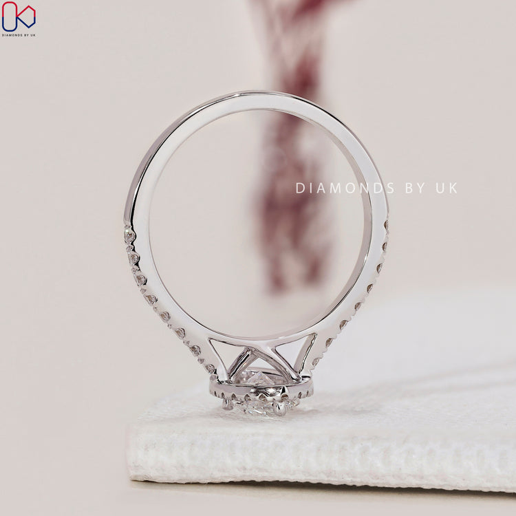 Shop to buy engagement ring featuring a marquise diamond design.
