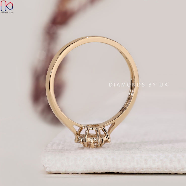 Lab-grown diamond ring with a modern halo design.
