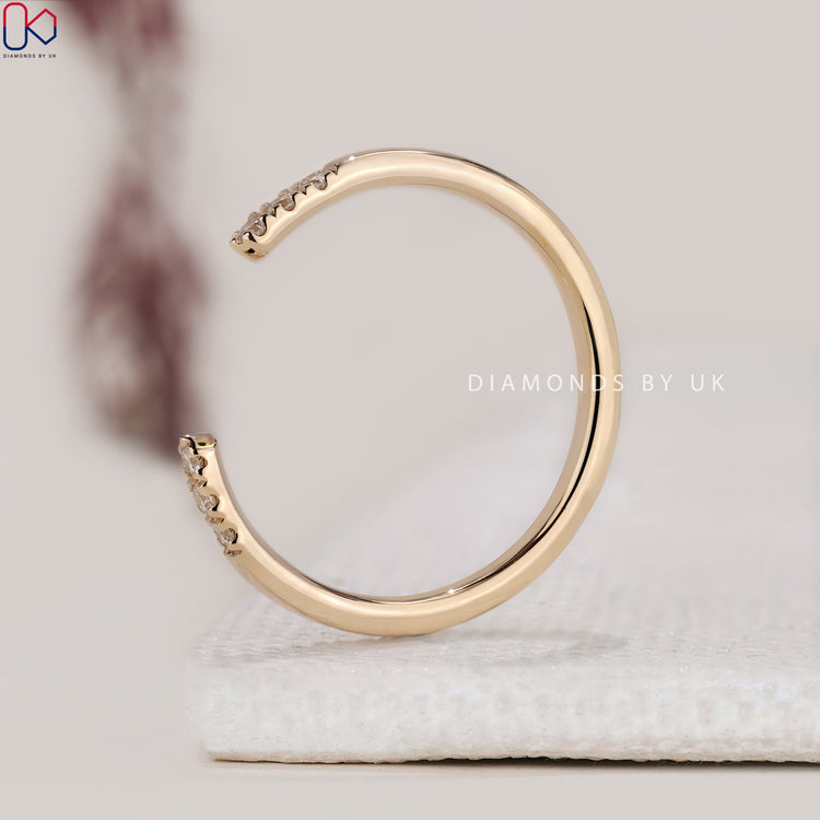 Diamondsbyuk band crafted with open gap and lab grown stones.
