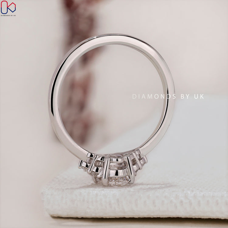 Handmade jewellery with a dazzling Oval Diamond Engagement Ring centrepiece.
