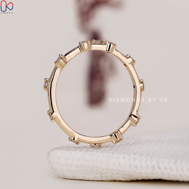 Lab grown diamond band offering ethical and eco-friendly beauty.
