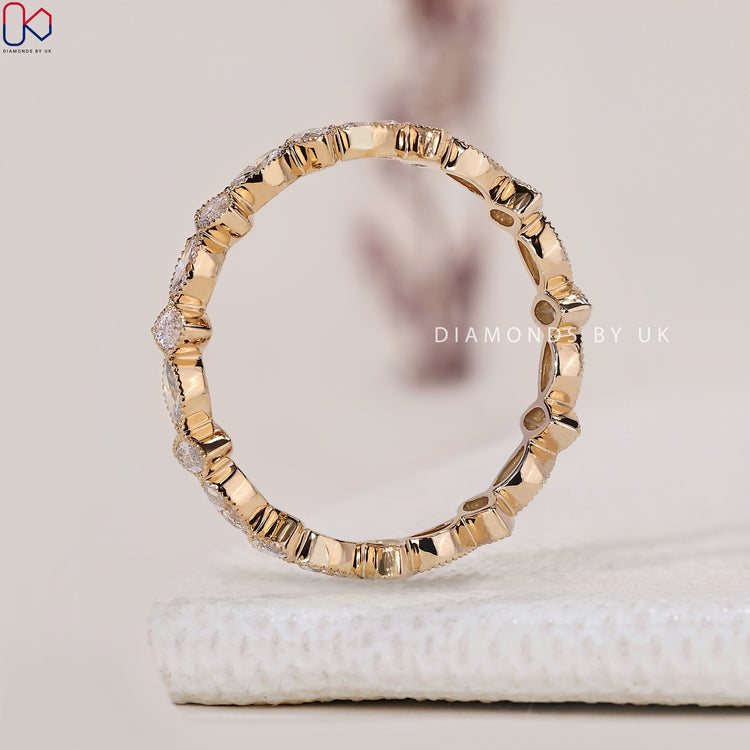 Customise wedding band in bezel set with full eternity layout

