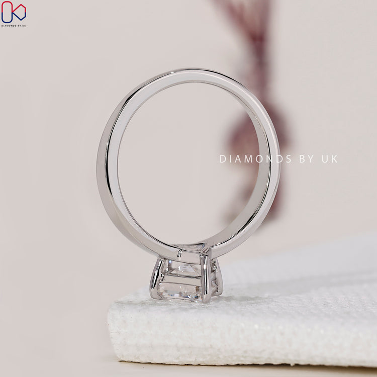 White gold ring with a lozenge cut diamond for a vintage-inspired look.
