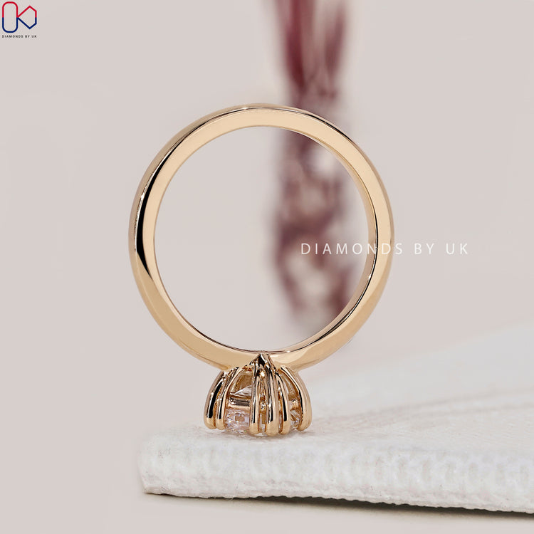 Lab grown asscher cut diamond ring in a handmade prong setting.
