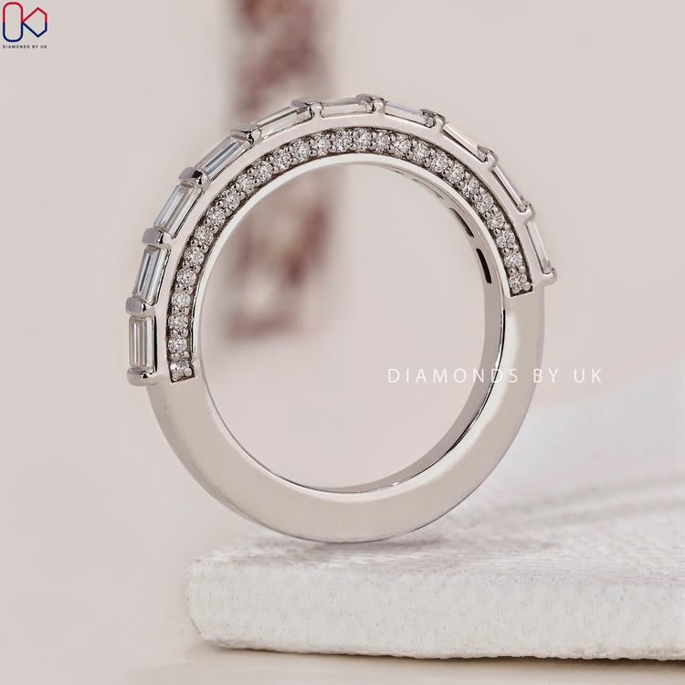 Half eternity band featuring diamonds halfway around for a luxurious touch.
