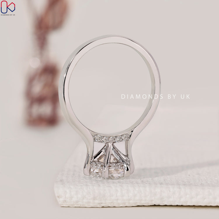 Double hidden halo engagement ring for added sparkle.
