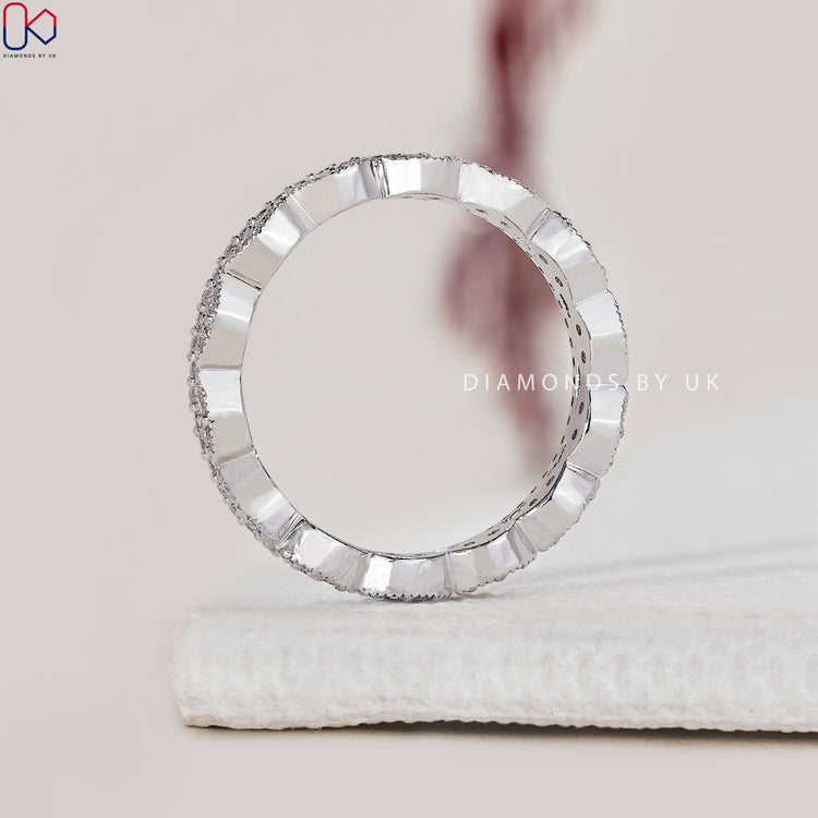 Diamondsbyuk wedding band made with handmade band and round cut diamonds.
