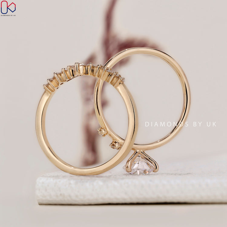 Yellow gold bridal set featuring a dazzling engagement ring.
