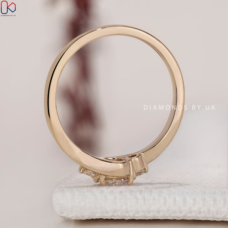 Round cut diamond ring sparkling with brilliance.
